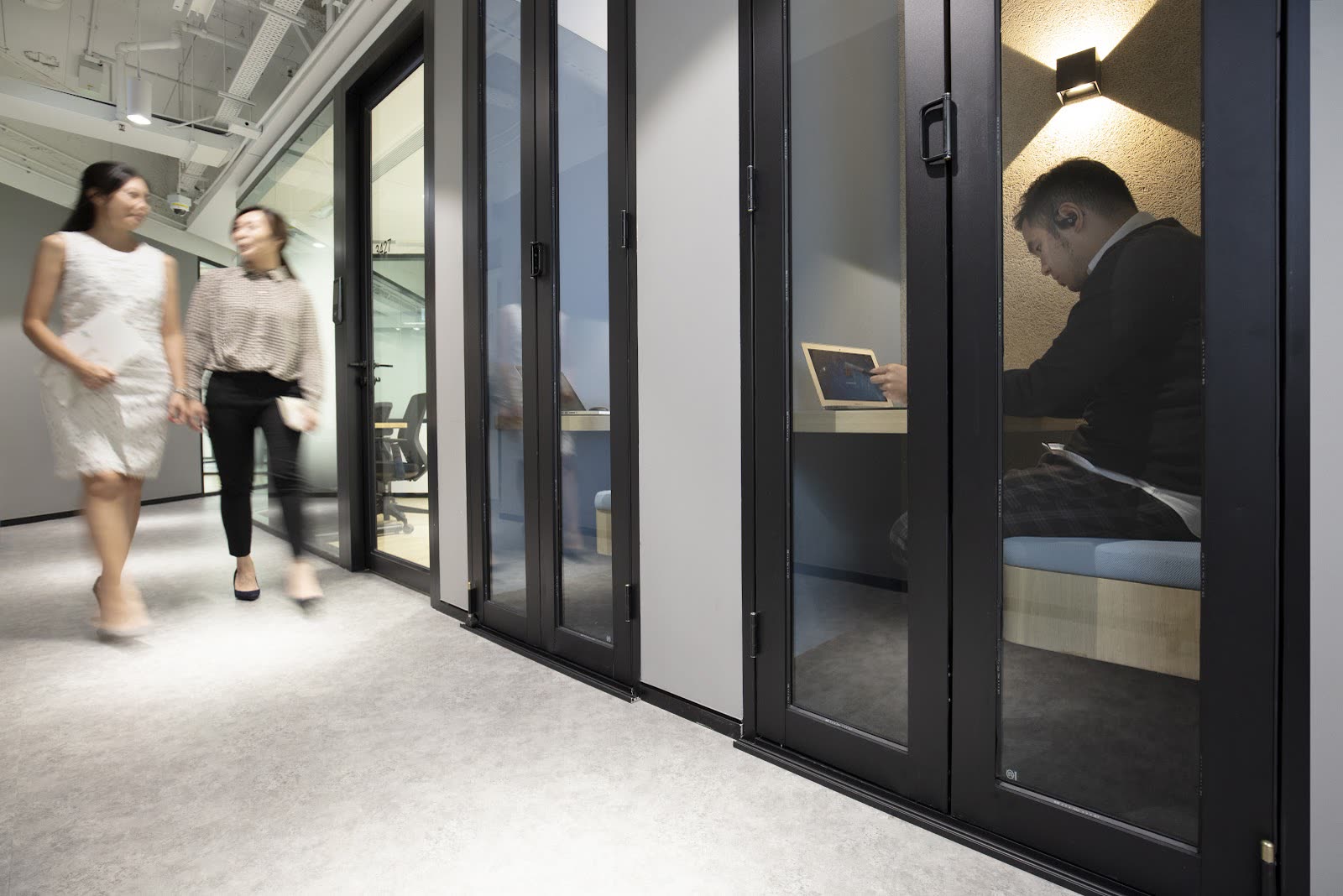 Office corridor with glass partitions - Mira Place